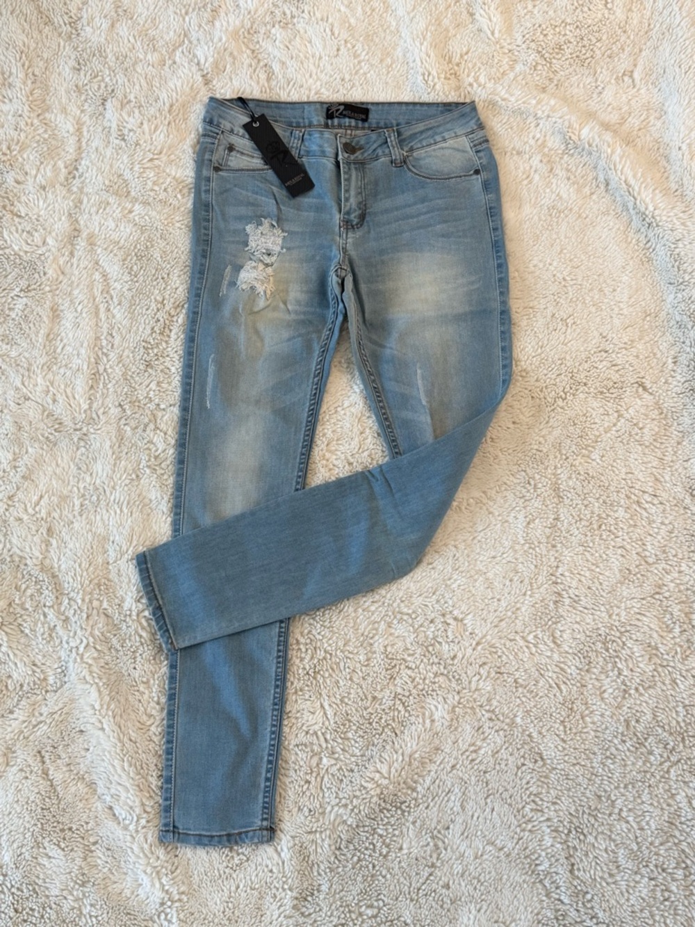 Women's Light Wash Distressed Skinny Jeans